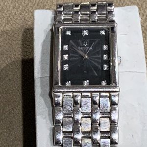 Mens Bulova watch, square face with crystal. Great time piece.